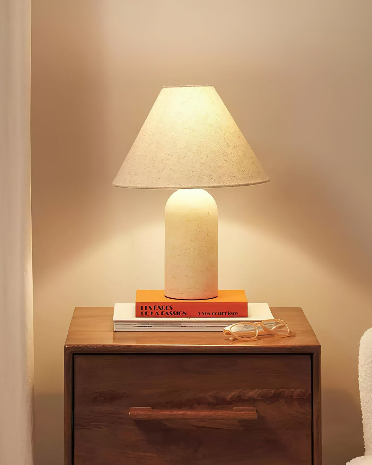 The Sacha Marble Table Lamp displayed in a white marble finish.