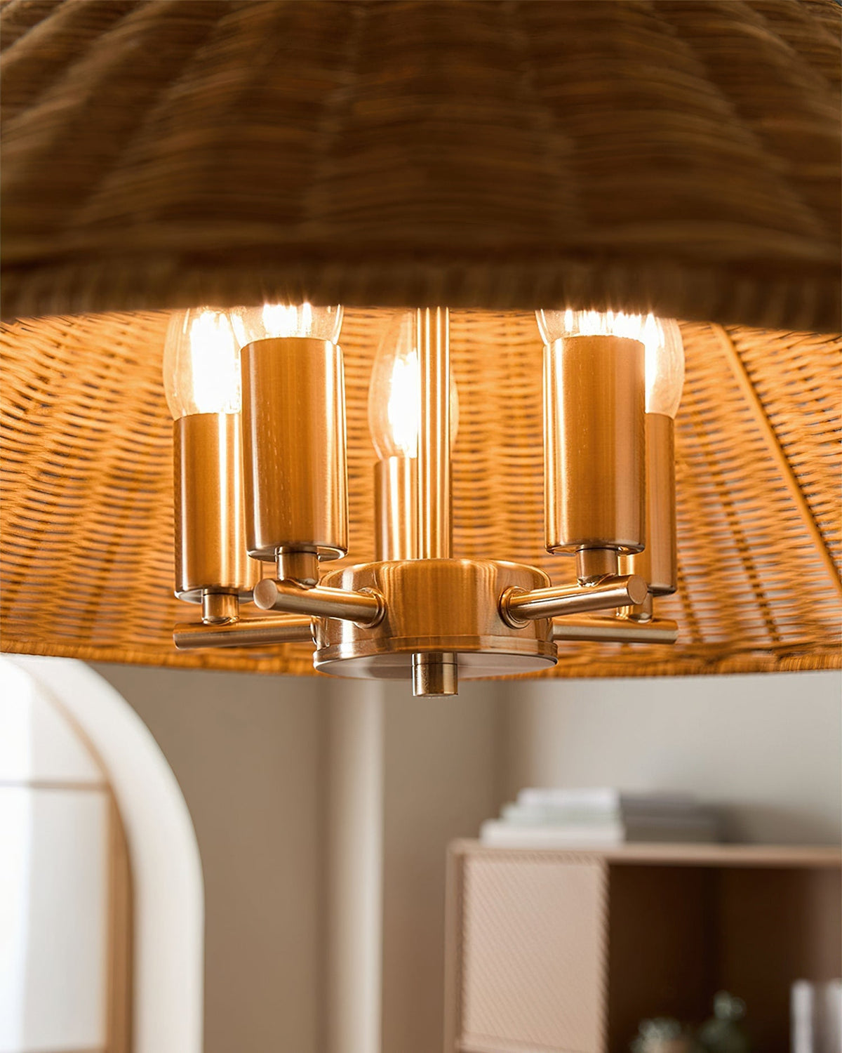 Detail shot of the gold metal hanging chain and ceiling canopy.