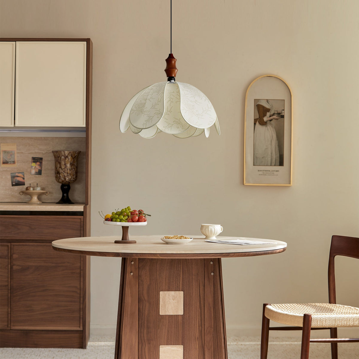 The Savoy Pendant Light shown from a low angle, highlighting its floral-inspired shape.