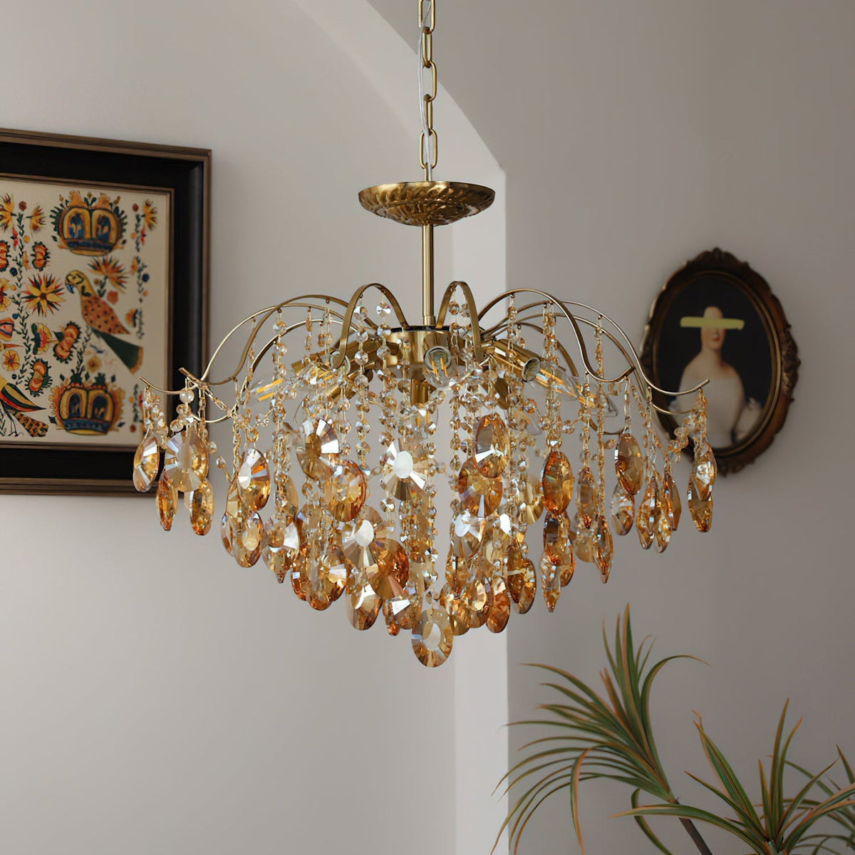 Medium size (19.7 inch) Sciolari Crystal Chandelier hanging over a dining table.
