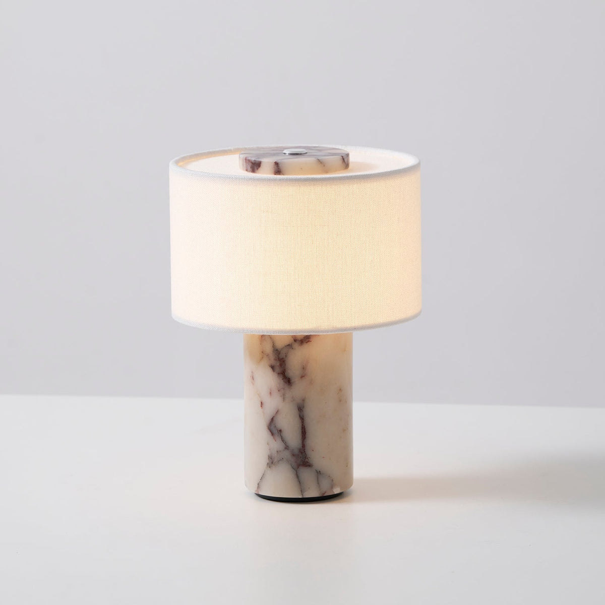 Detail shot of the lamp's layered ceramic base.