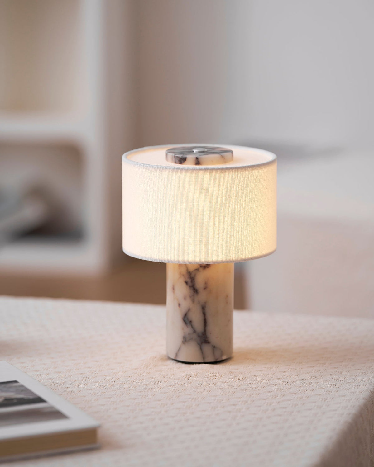 Detail of the lamp's base material, showing its sedimentary pattern.