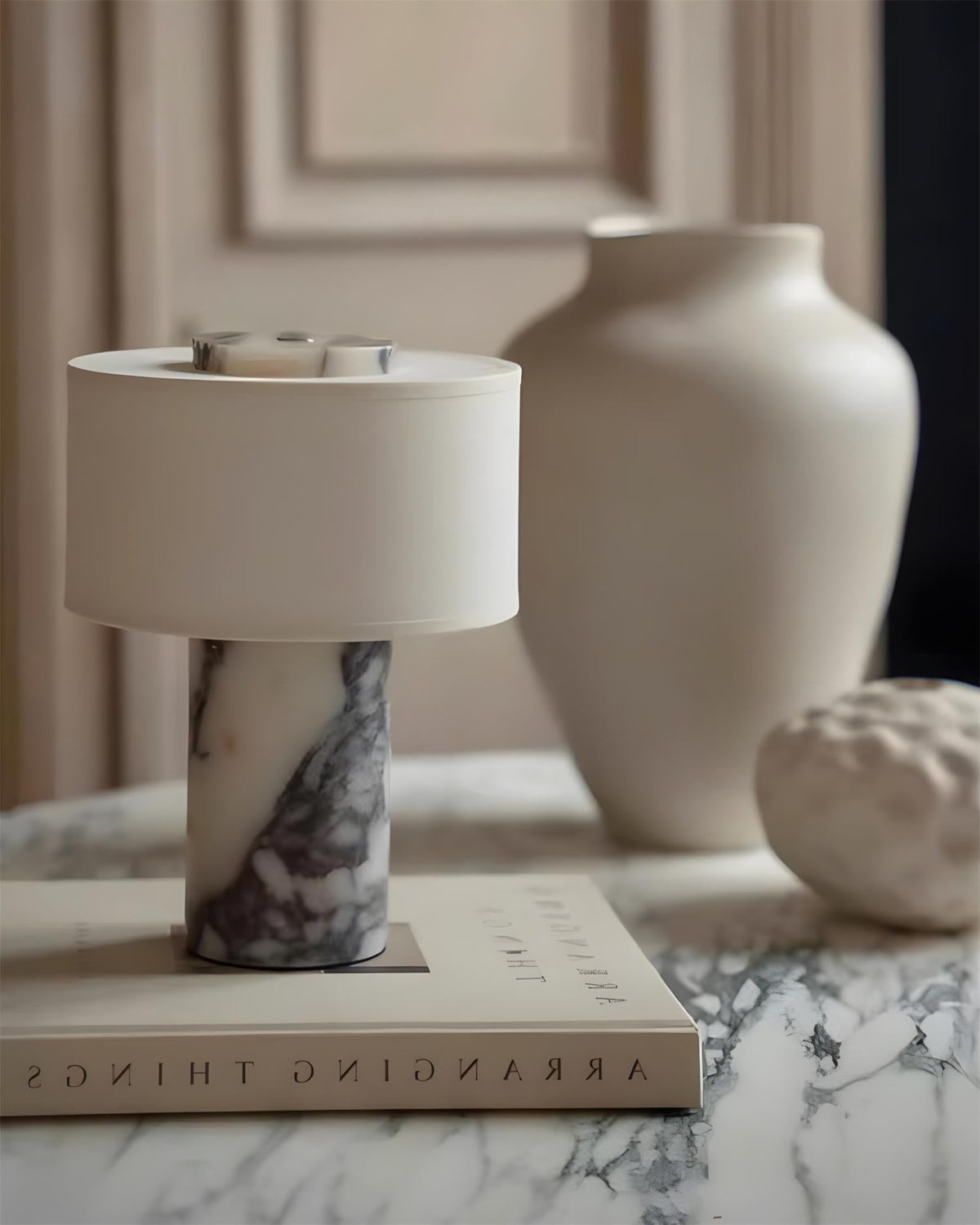 Close-up of the finial on top of the lampshade.