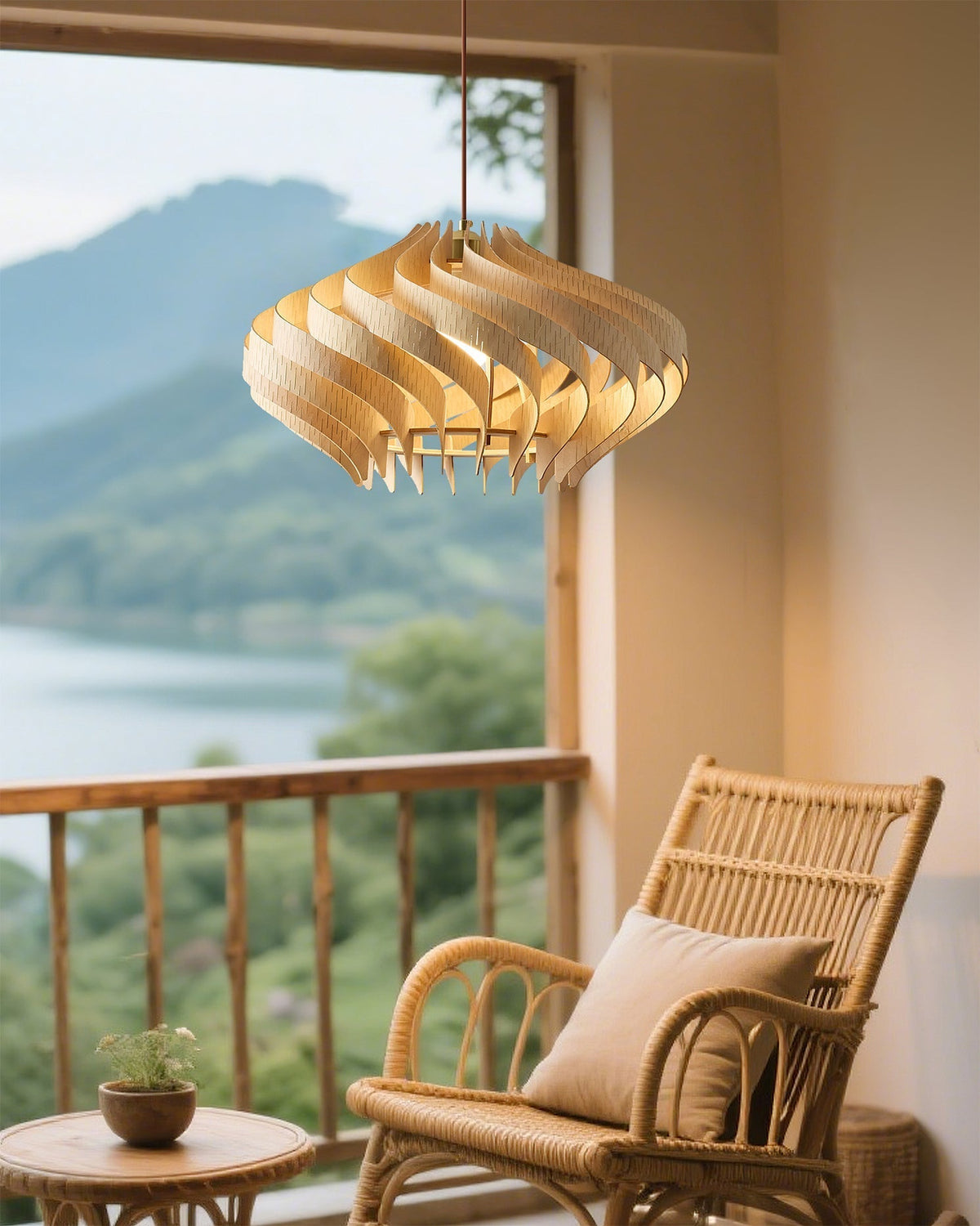 The Serentia Pendant Light illuminated, casting a warm glow in a room.