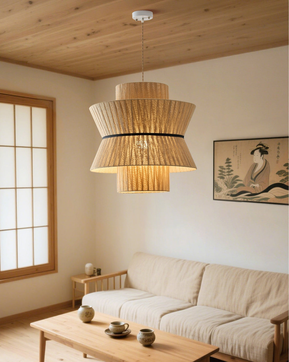 Sicel Pendant Light hanging in a modern living room setting.