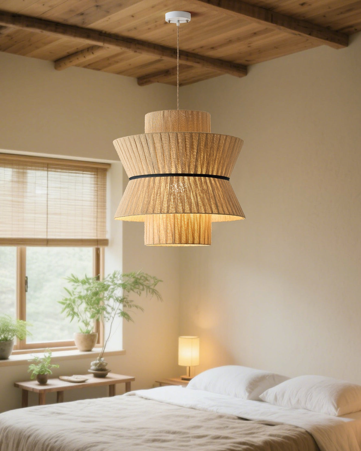 The largest size of the Sicel Pendant Light shown above a dining table.