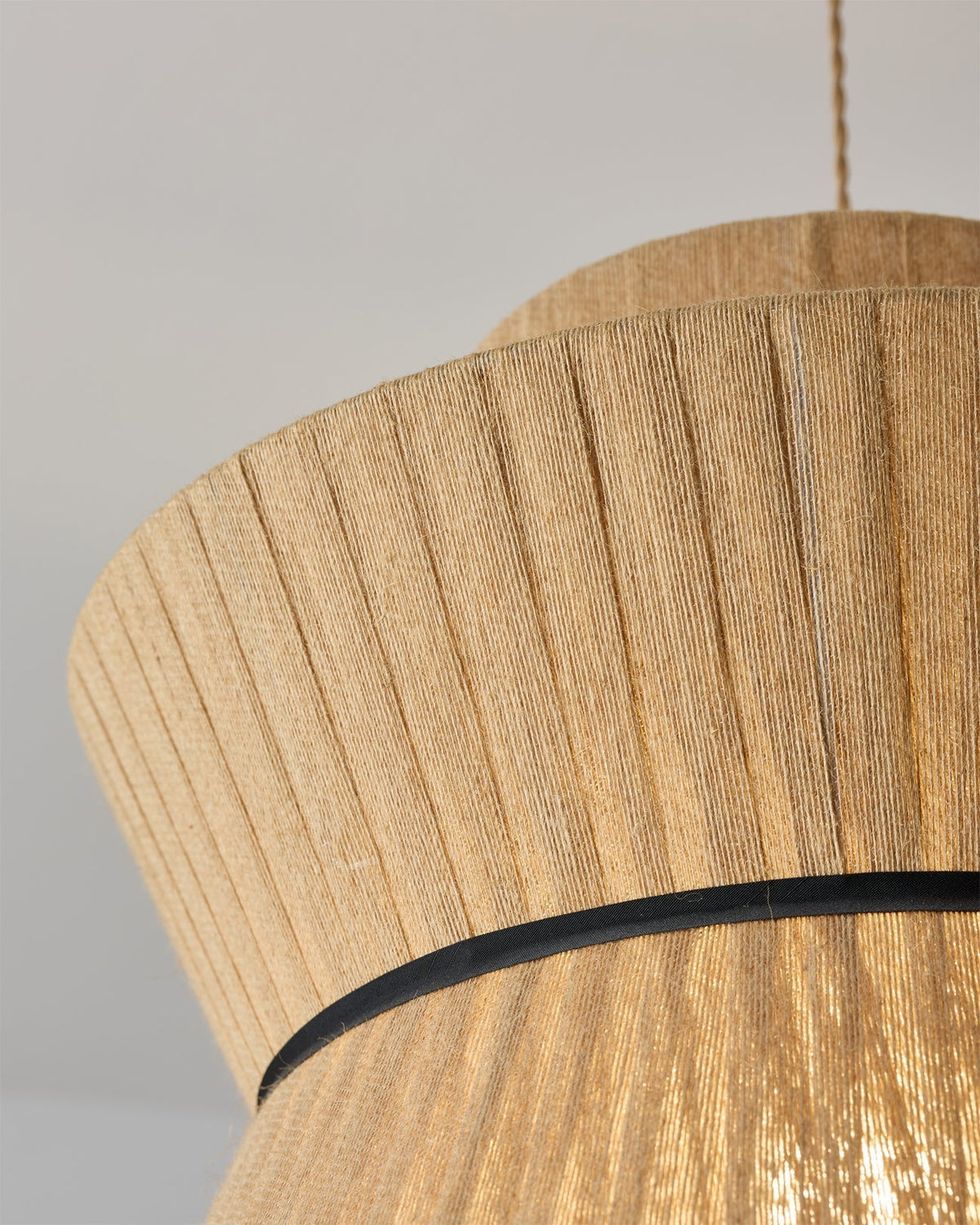 Angled view showcasing the layered and pleated structure of the shade.