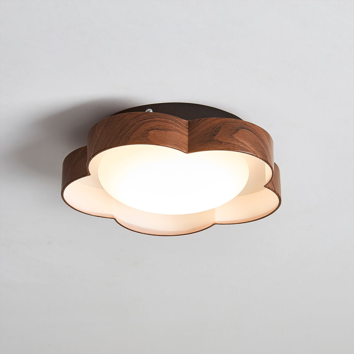 The Sika Ceiling Lamp installed on a white ceiling.