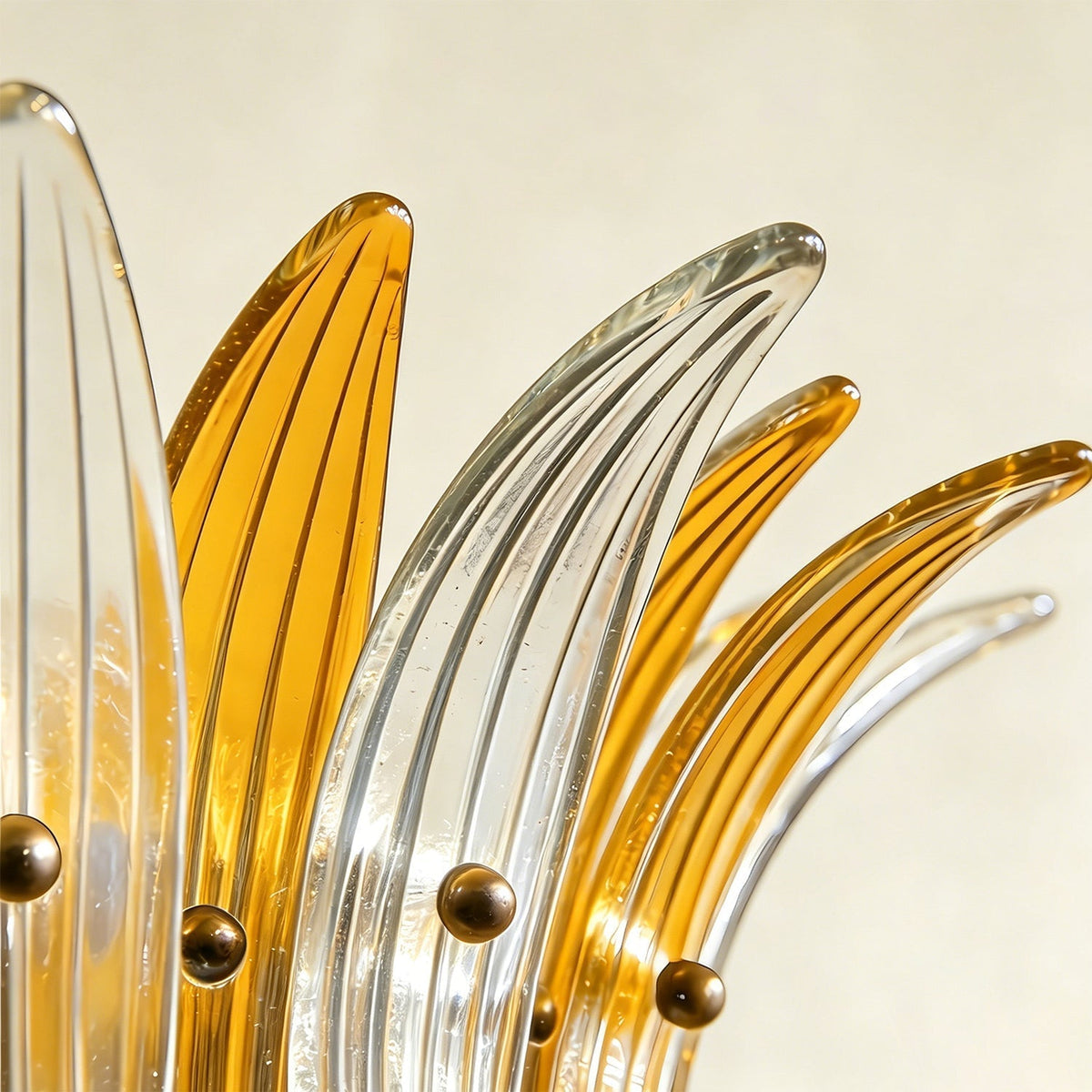 Smeralda Wall Sconce shown lit, demonstrating light diffusion through the fluted glass.