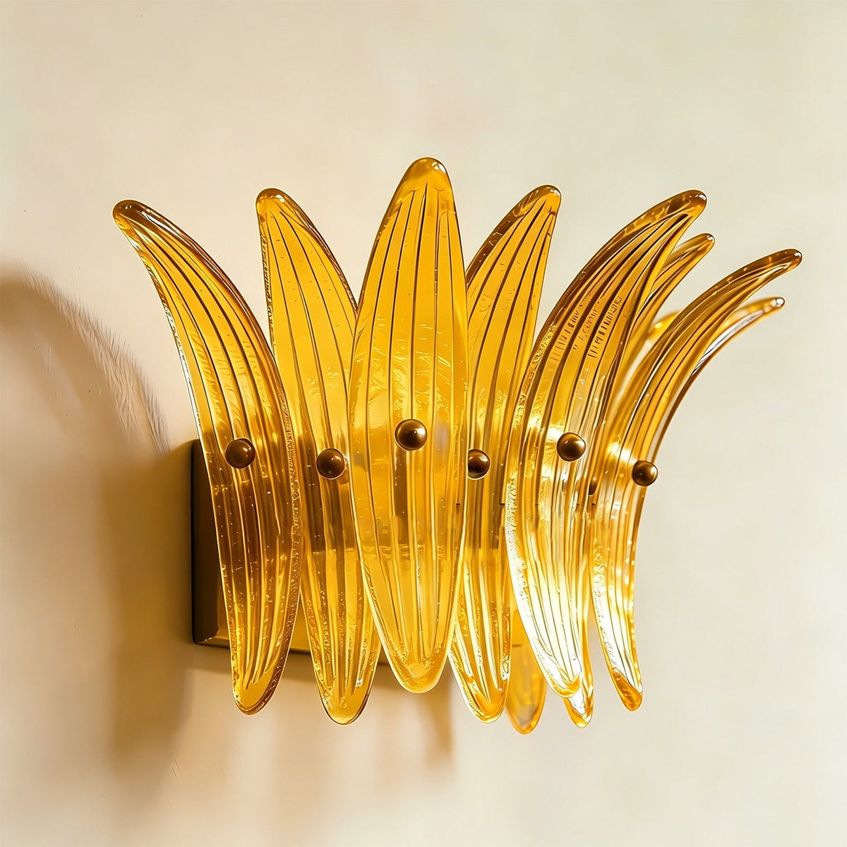 Amber Smeralda Wall Sconce creating a cozy atmosphere in a dimly lit room.