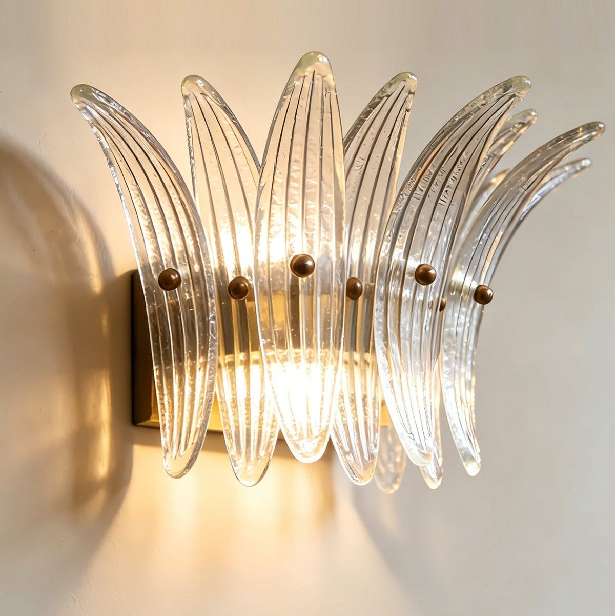 Close-up detail of the Clear ribbed glass on the Smeralda Wall Sconce.