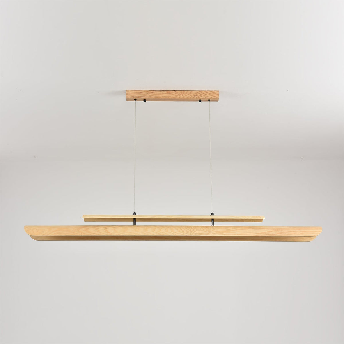 The 120cm version of the chandelier in a compact dining space.