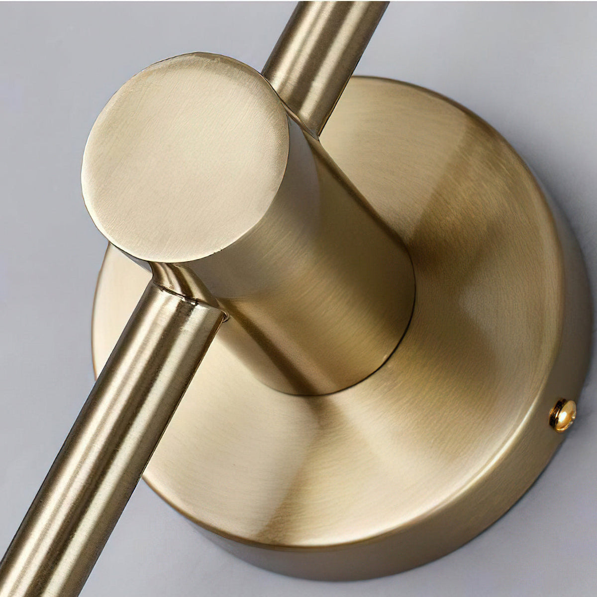 Detail shot of the gold finish and mounting hardware of the Sorle Wall Lamp.