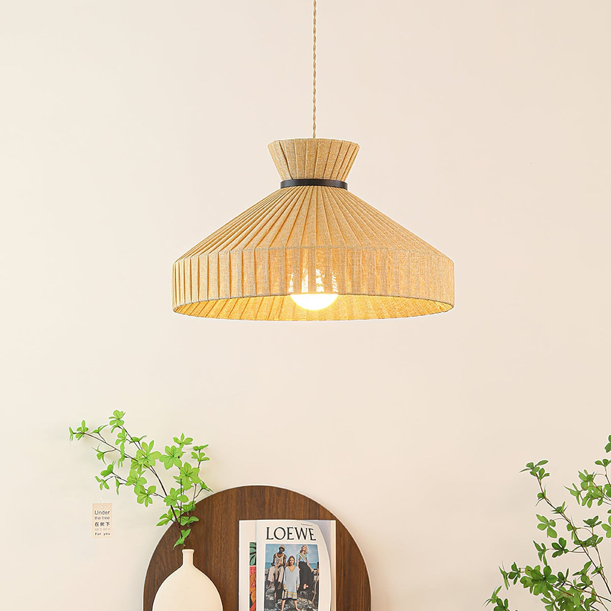 Close-up view of the pleated fabric texture on the Surora Pendant Light.