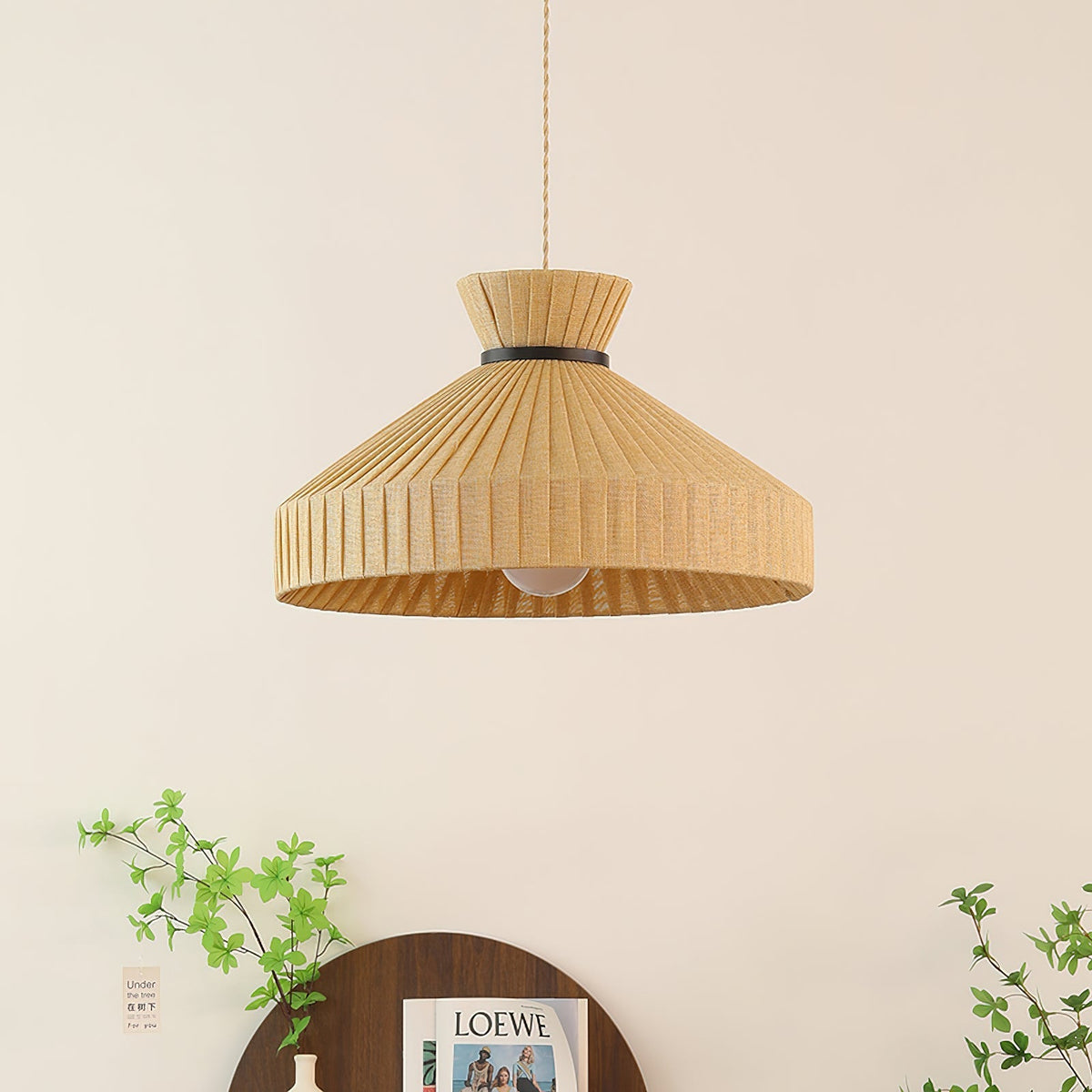 Surora Pendant Light hanging in a modern dining room setting.