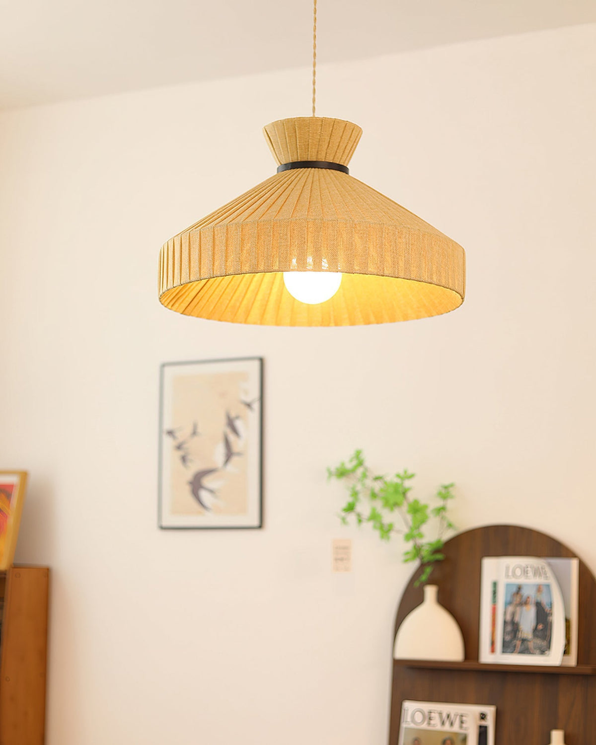 The medium size of the Surora Pendant Light over a kitchen island.