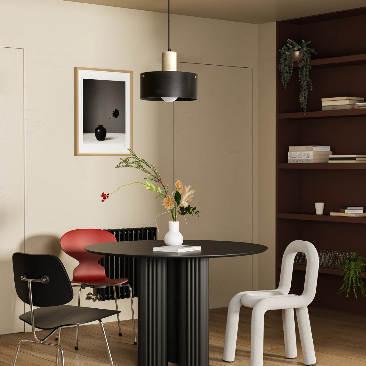 Close-up view of the Tako Pendant Lamp's travertine and wood materials.