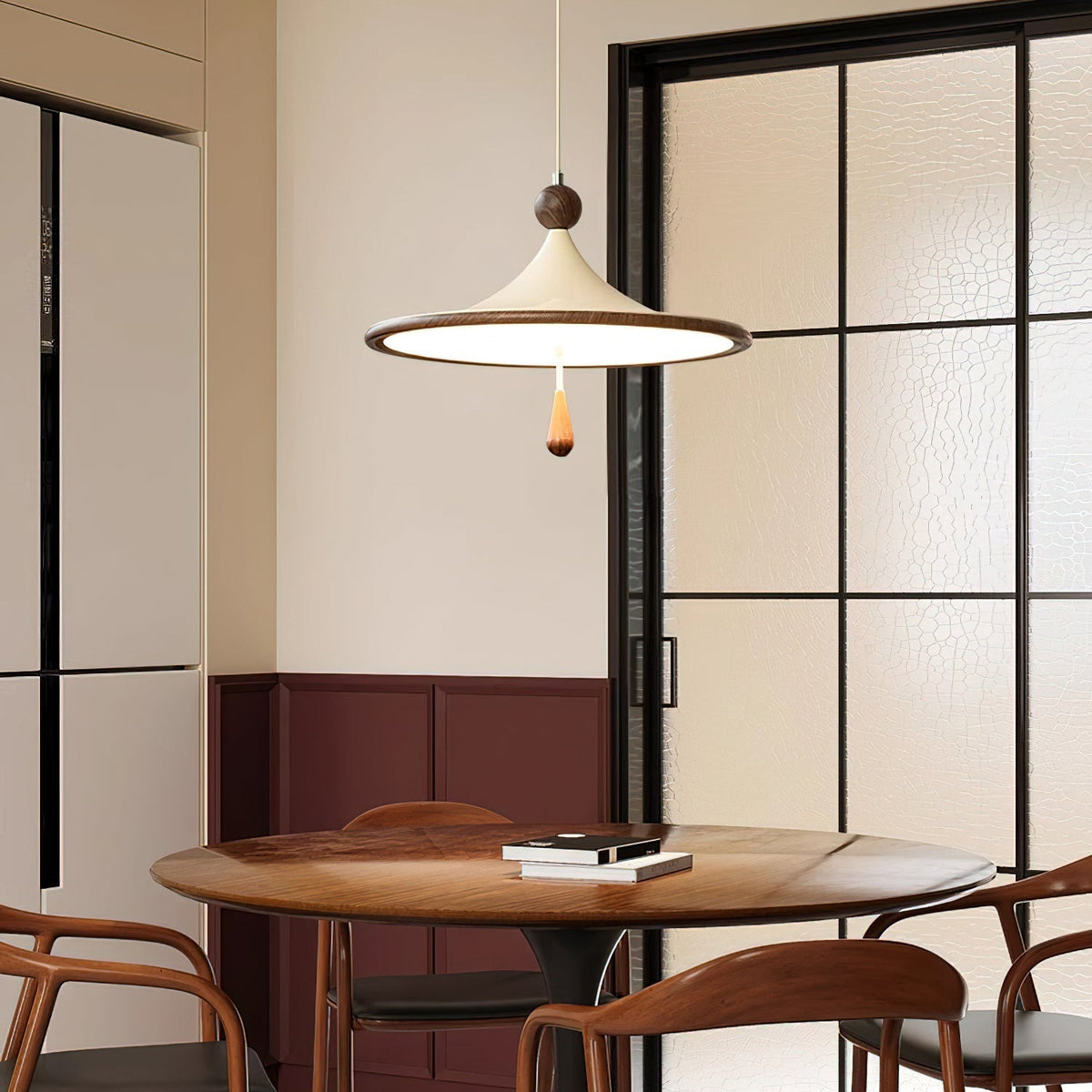 Side profile of the Tomaso Pendant Light against a plain background.