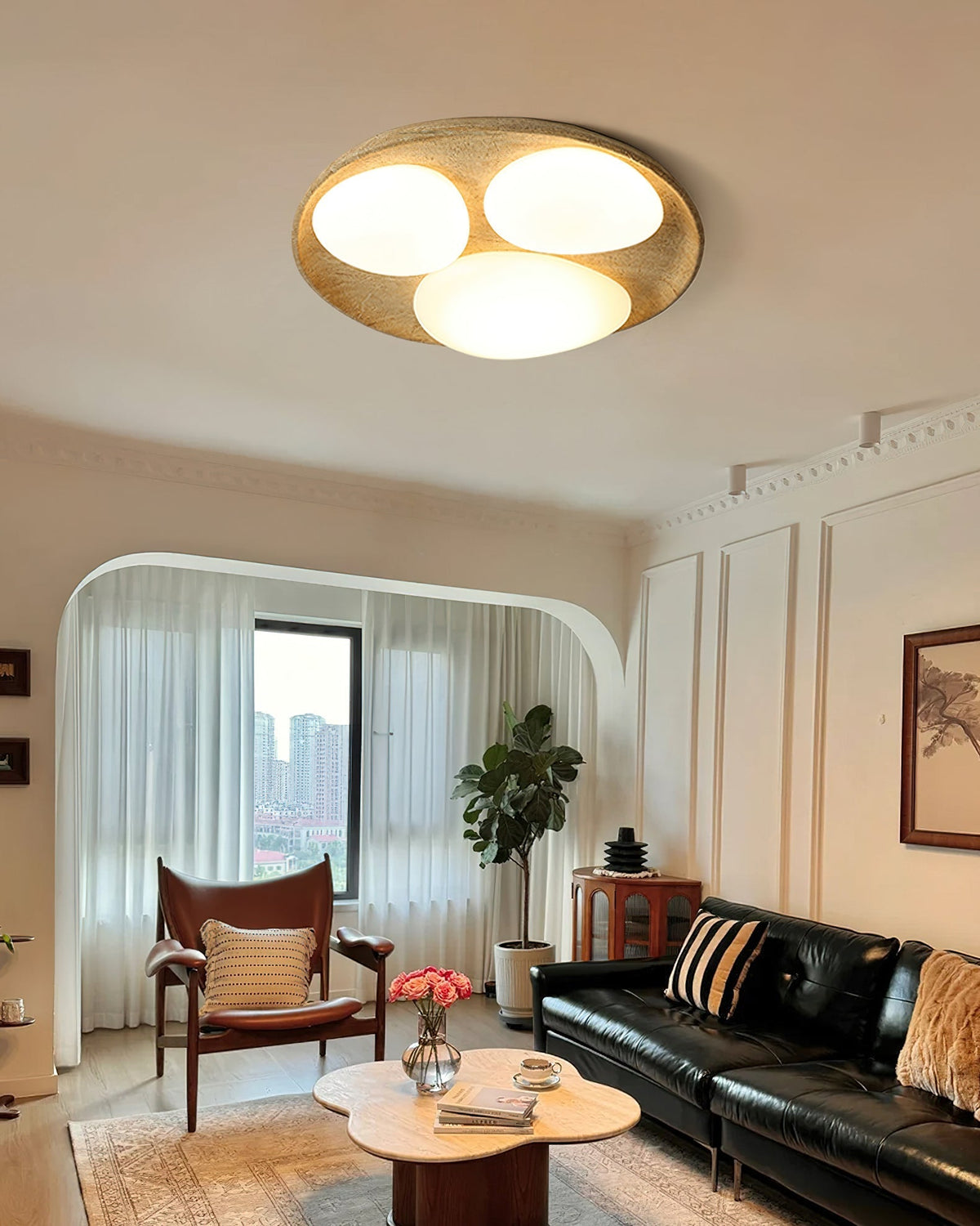 Topo Ceiling Light installed in a modern living room setting.