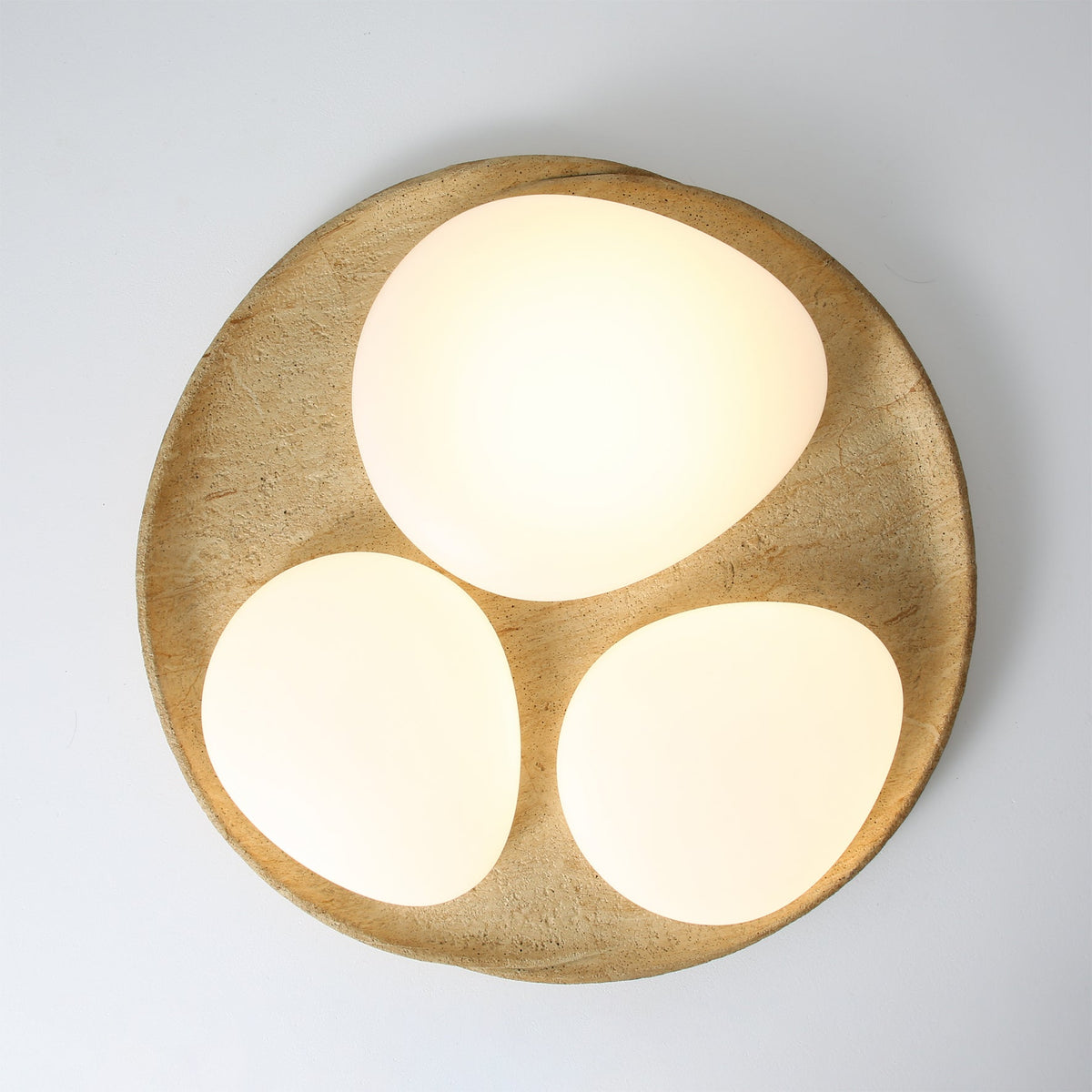 Model B of the Topo Ceiling Light, highlighting its larger size.