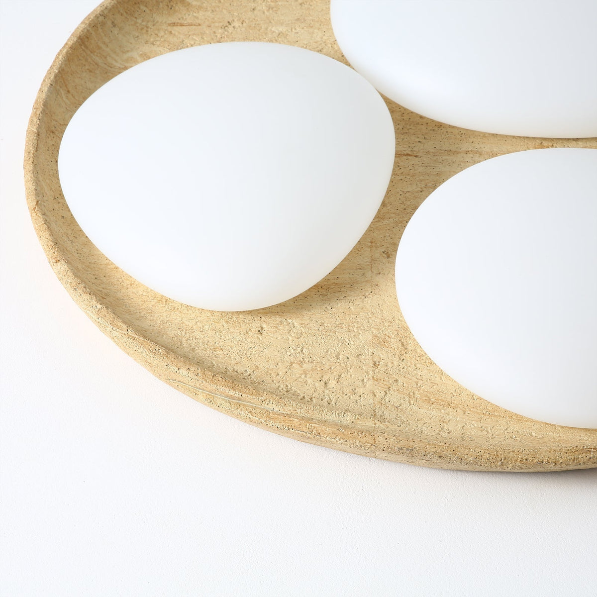 Side profile of the Topo Ceiling Light, showing its low profile.
