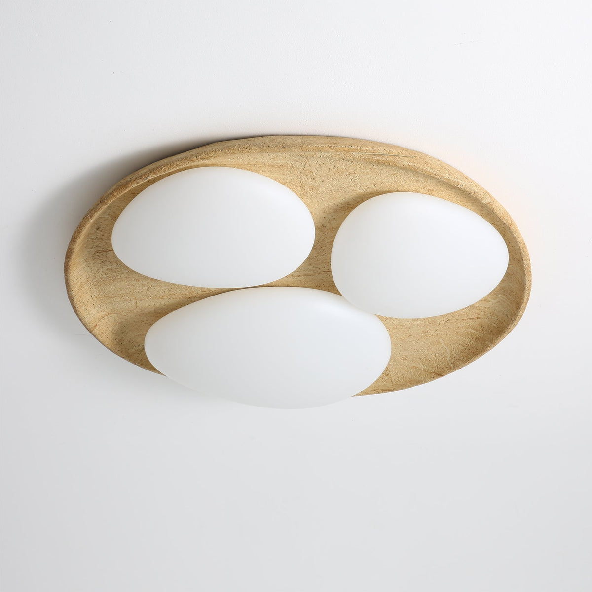 Lifestyle image of the Topo Ceiling Light in a bedroom.