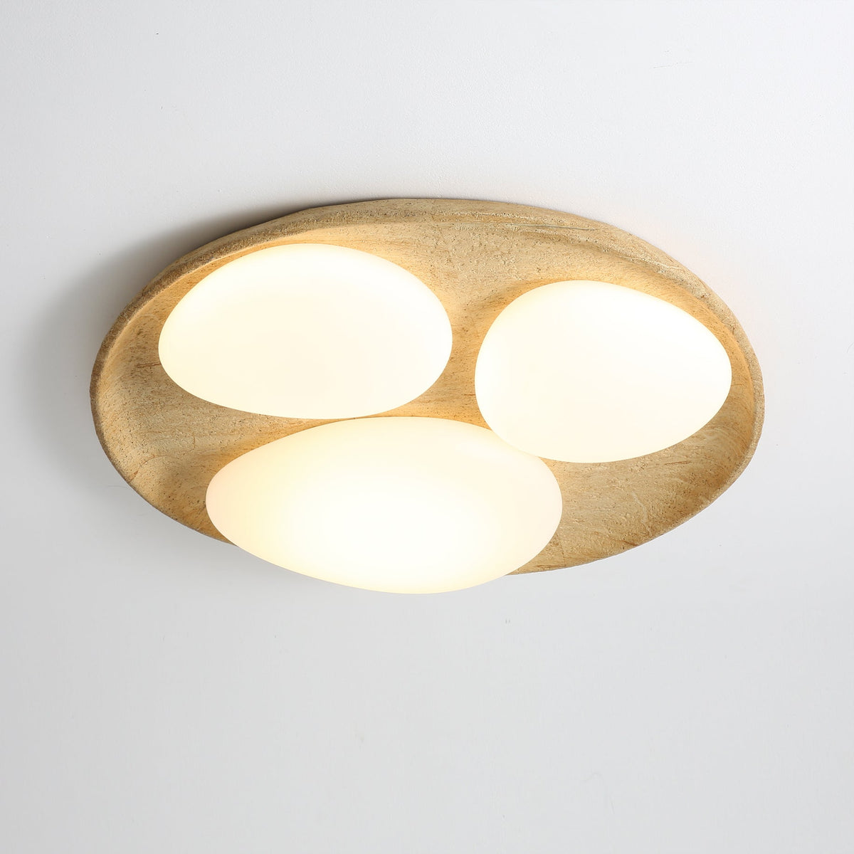 The beige and white finish of the Topo Ceiling Light.