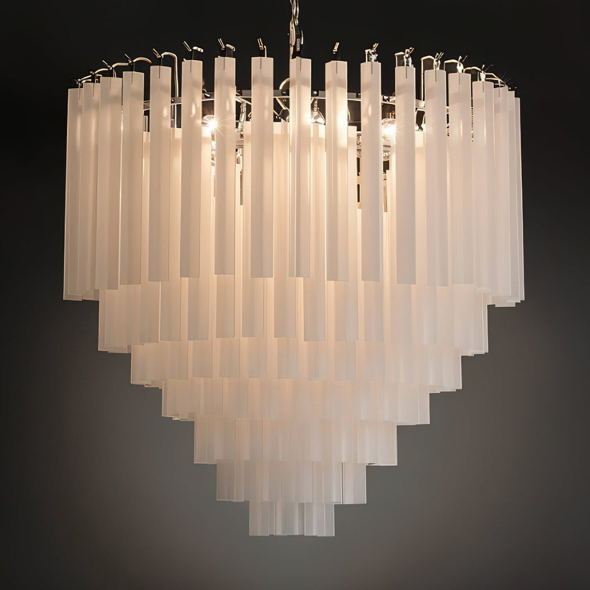 Triedra Cascade Chandelier against a dark wall for contrast.