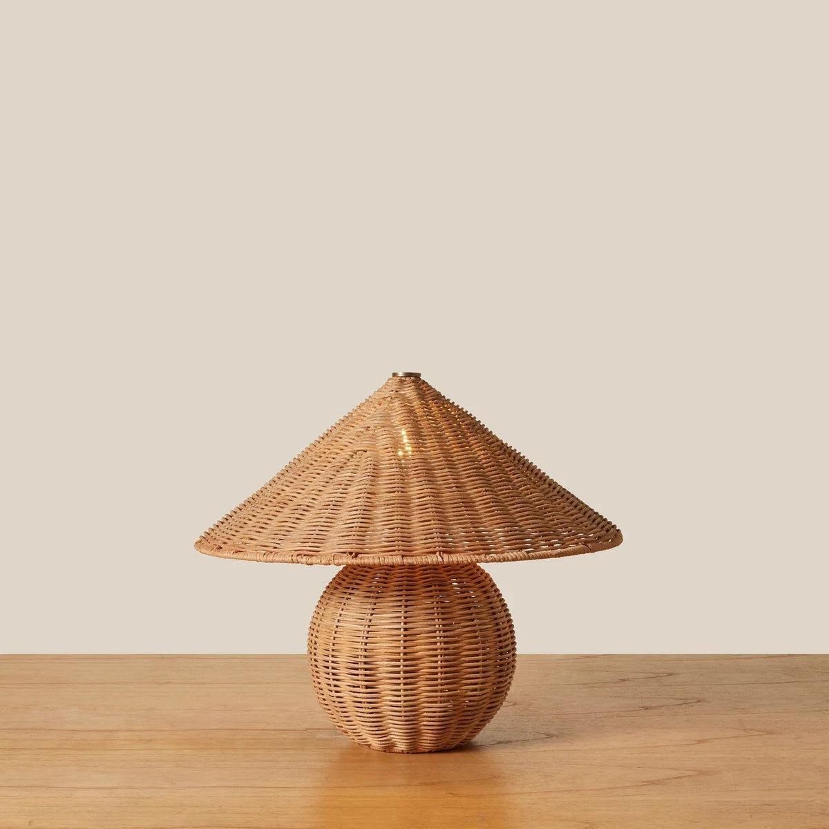 The Bobine Table Lamp turned on, casting a warm and inviting glow.