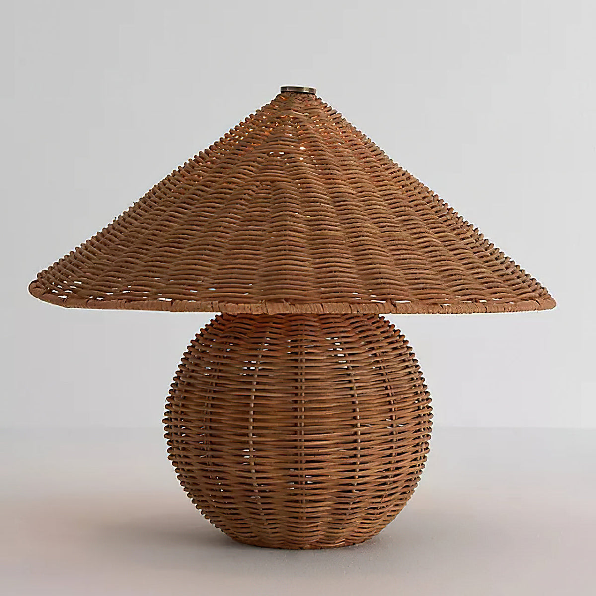 Detailed view of the hand-woven texture of the rattan.