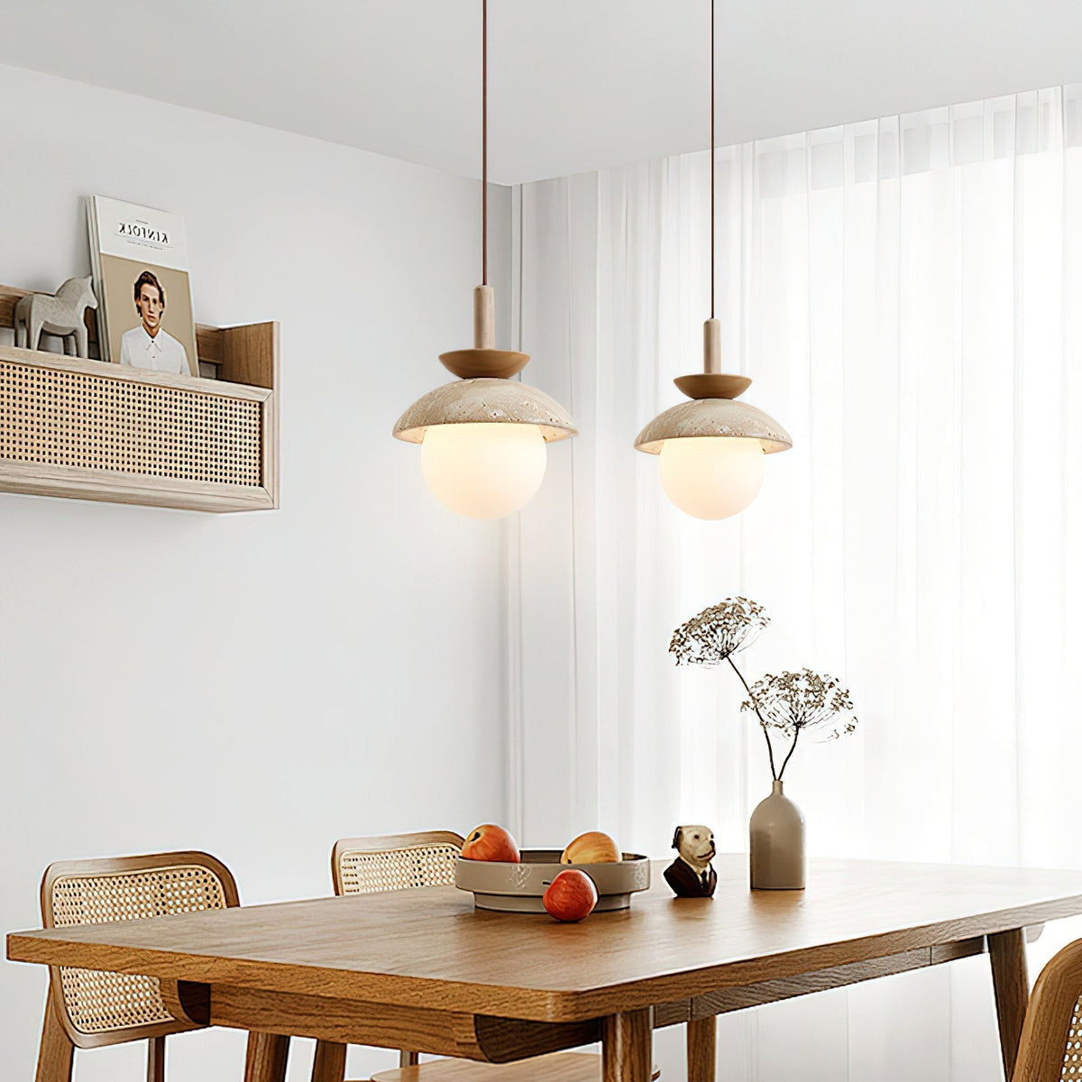Close-up of the Valerie Pendant Light's natural travertine shade.