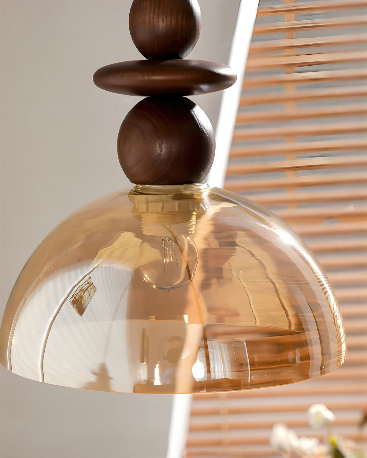Top view of the pendant showing the ceiling mount and wooden frame.