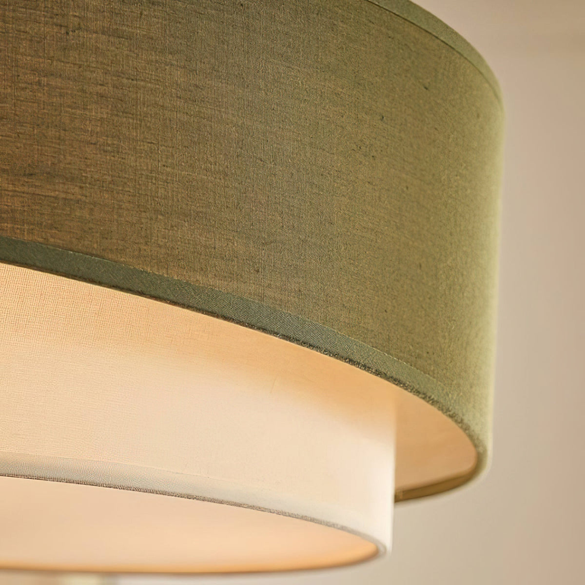 Vanelia Ceiling Lamp illuminated, highlighting the cream inner diffuser.