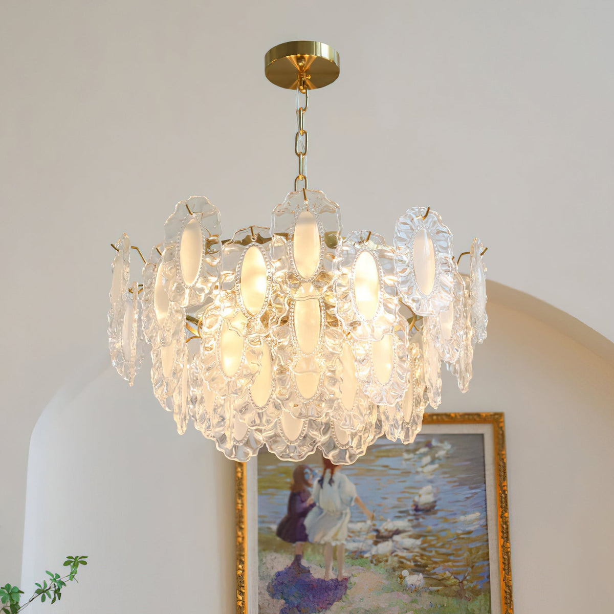 Varvara Glass Chandelier illuminated, casting a soft, romantic glow.