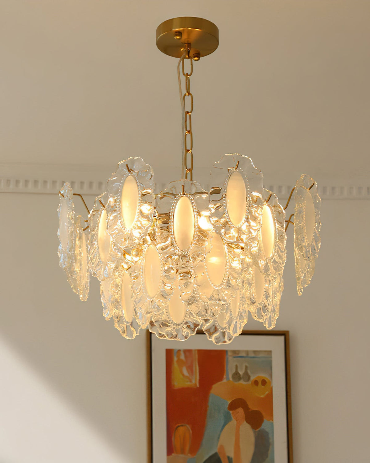 Side profile of the Varvara Glass Chandelier against a neutral wall.