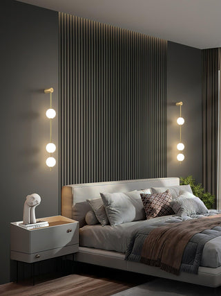 Lustra Applique Murale Sphères Verticales Laiton