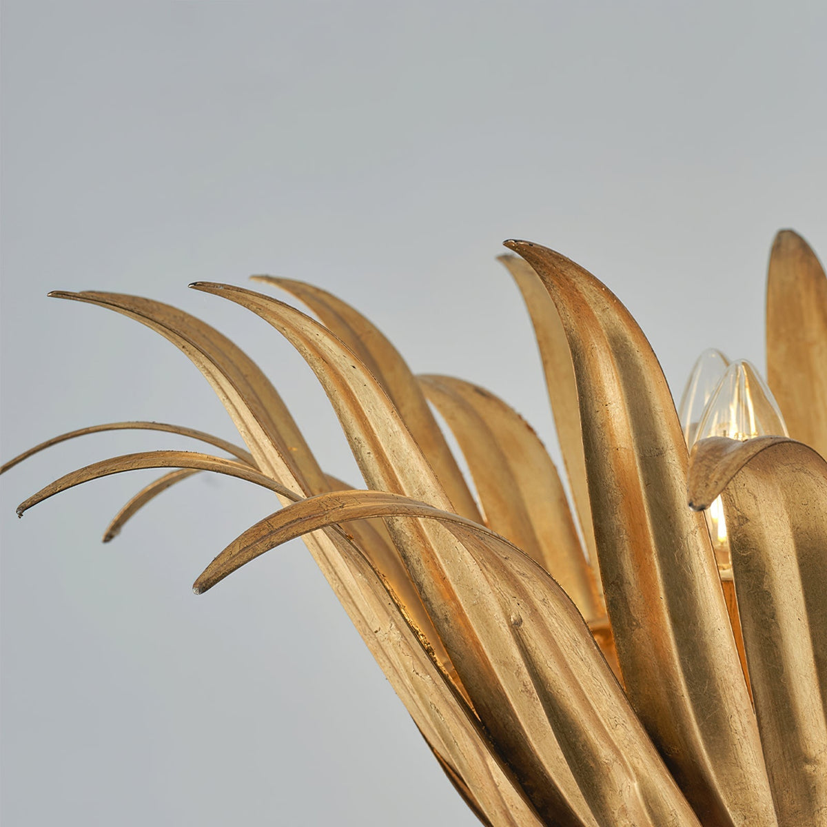 Detail shot of the E14 bulb socket area within the leaves.