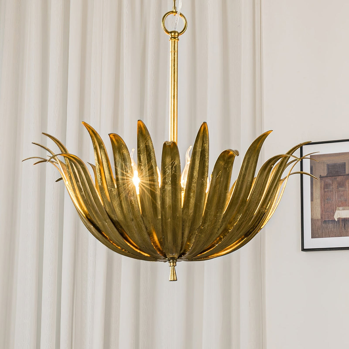 The blooming chalice silhouette of the Vicenzio pendant light.