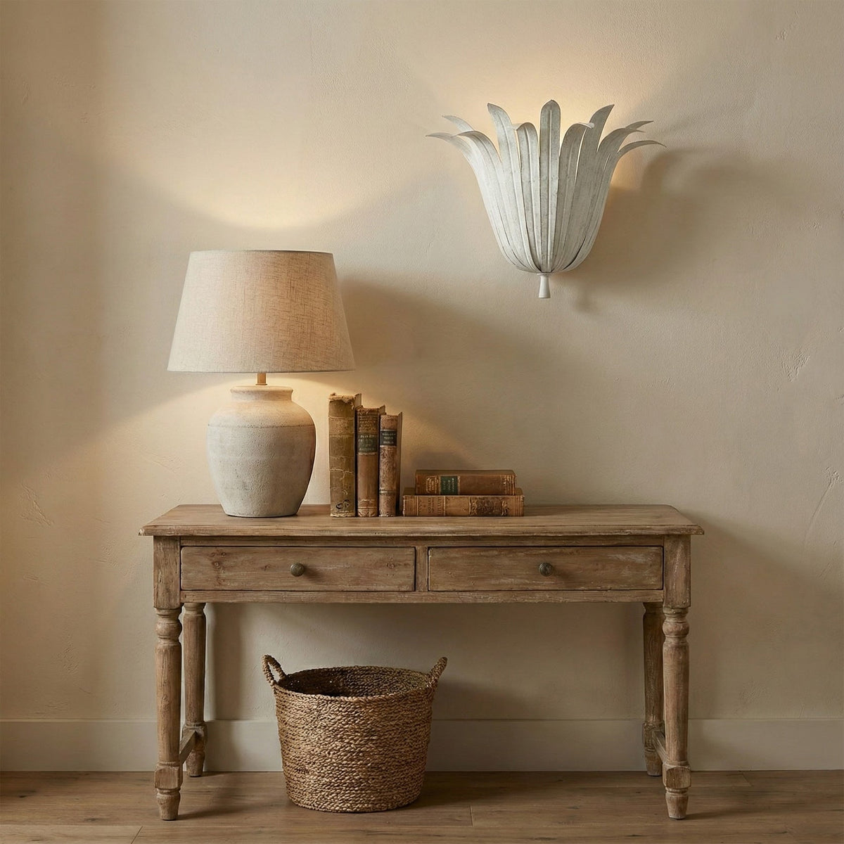 Vicenzio Leaf Wall Lamp in white, shown in a bedroom.