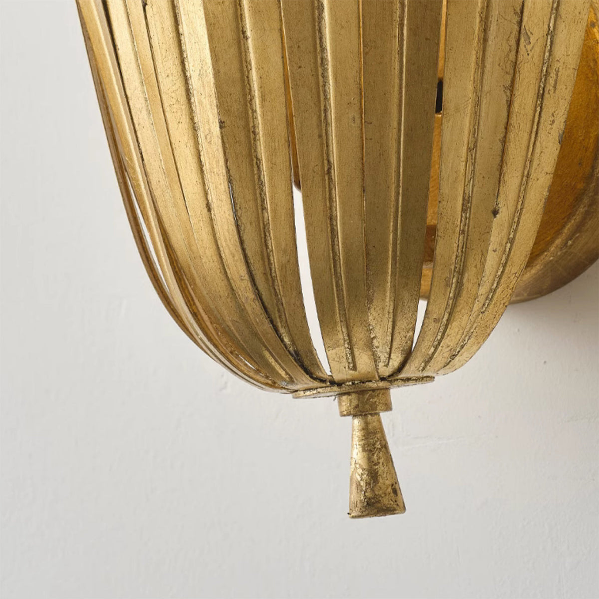Angled view of the white Vicenzio Leaf Wall Lamp.