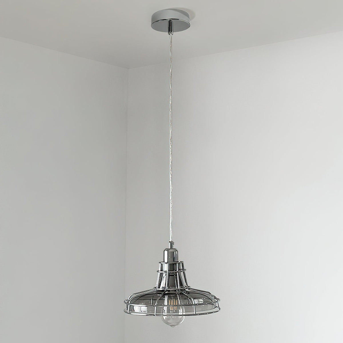 Lifestyle image of the Williston Pendant Light in an urban loft.