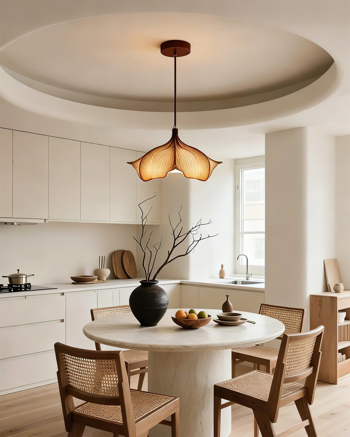 The Viscontea Pendant Light in an entryway, providing a warm welcome.