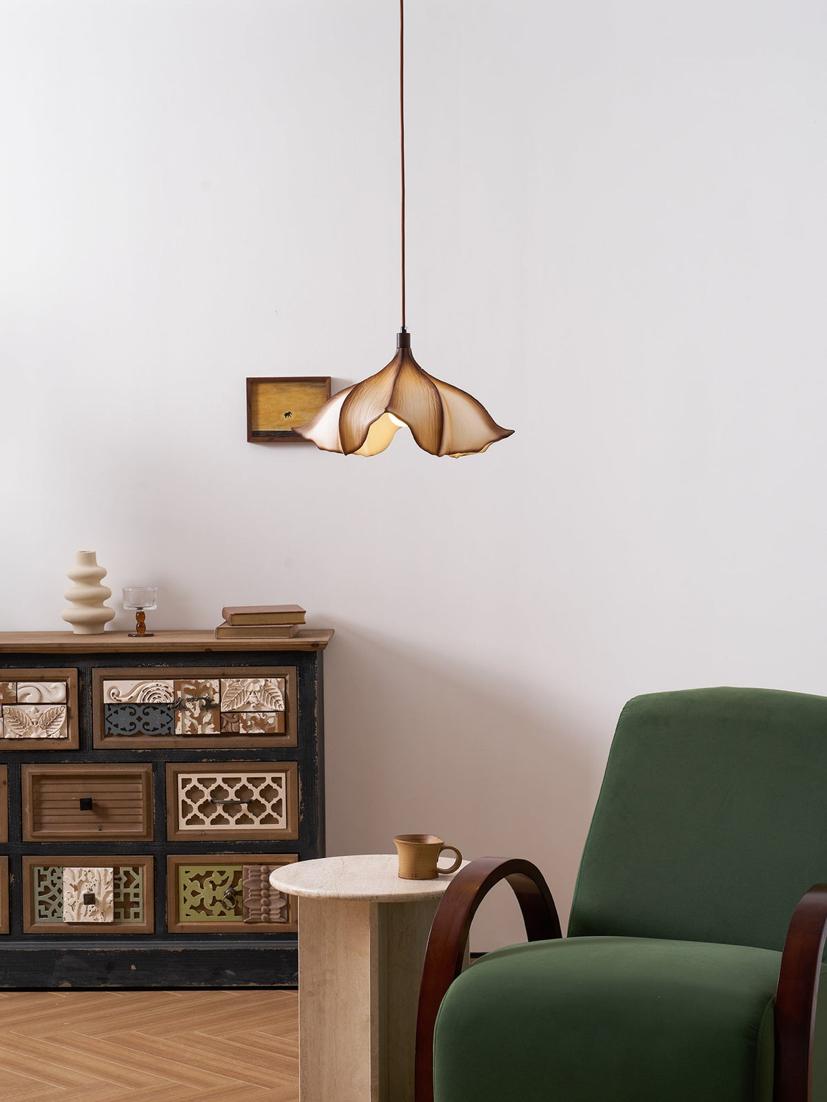 The Viscontea Pendant Light as a focal point in a high-ceiling room.