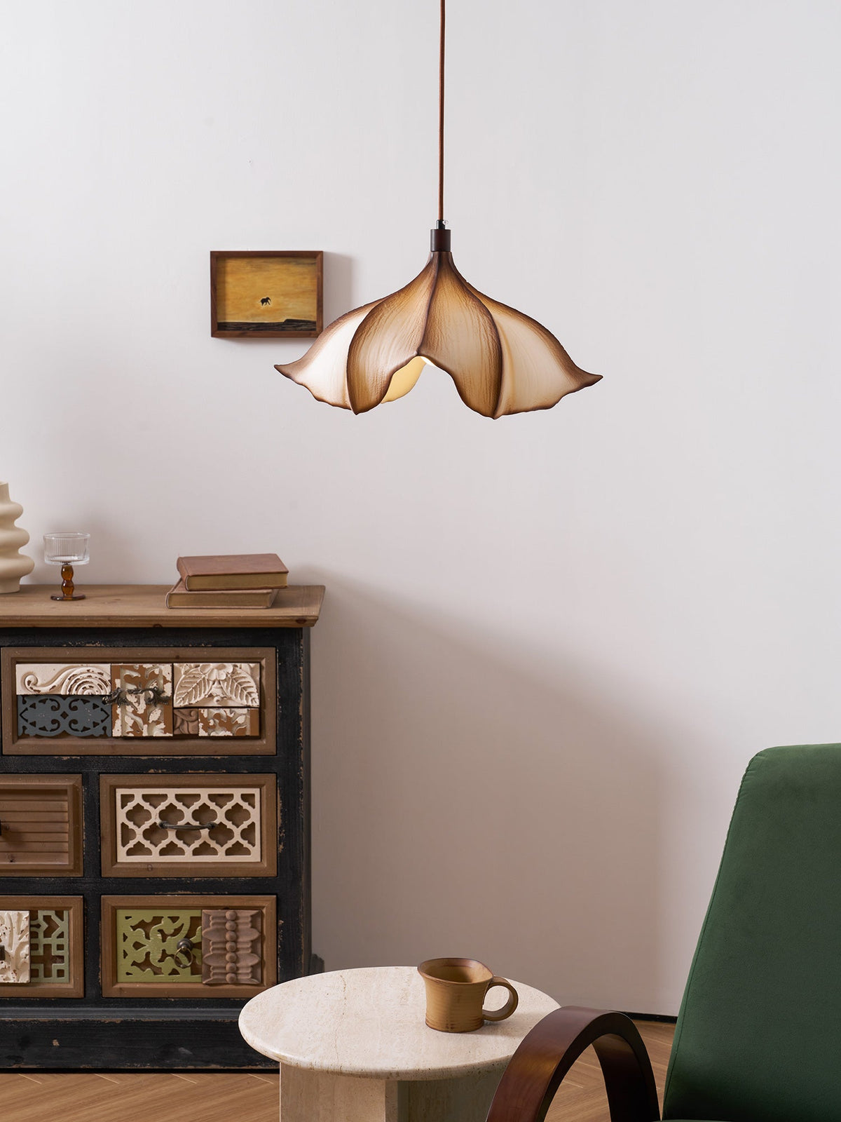 Viscontea Pendant Light hanging over a kitchen island.