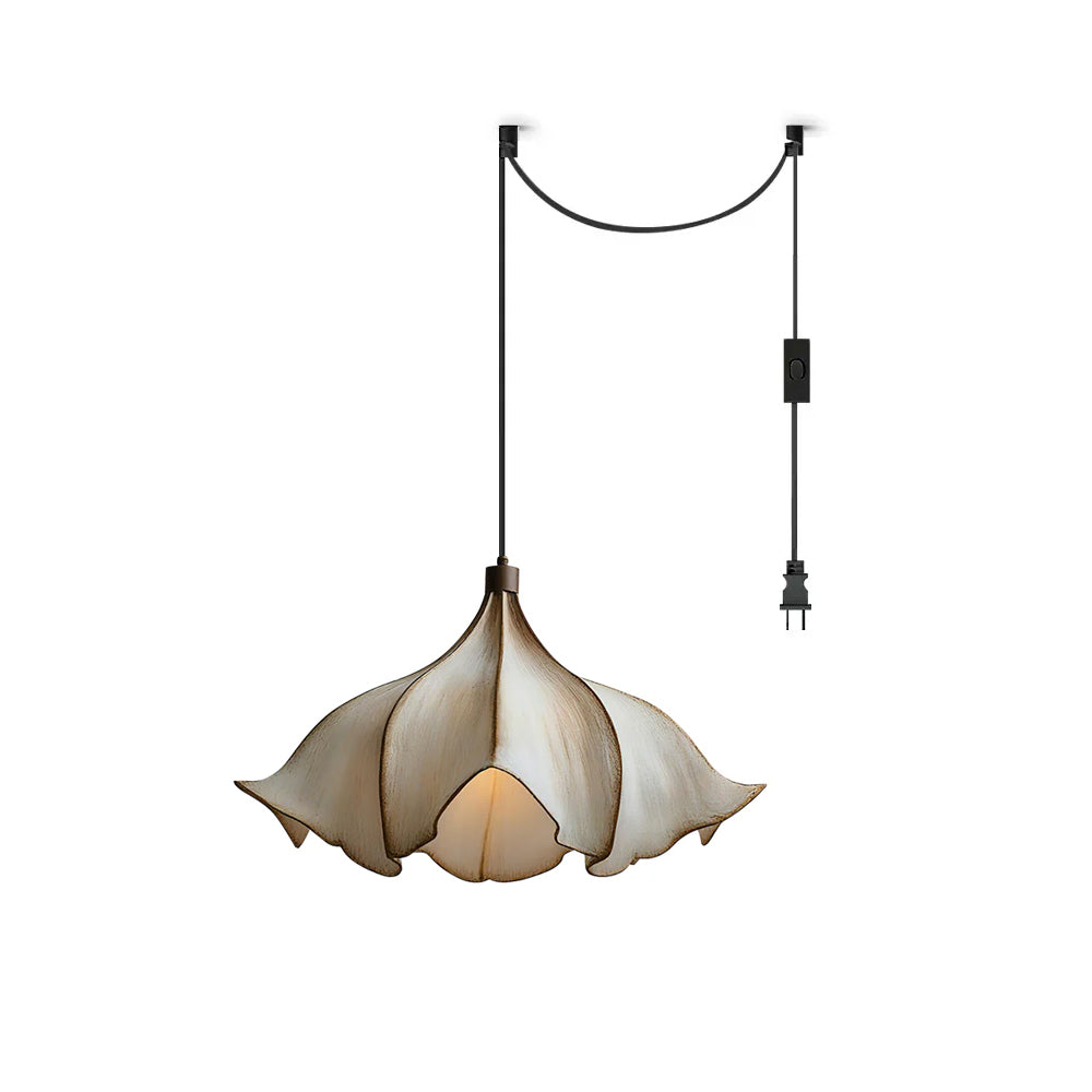Viscontea swag pendant light hanging in a modern living room.