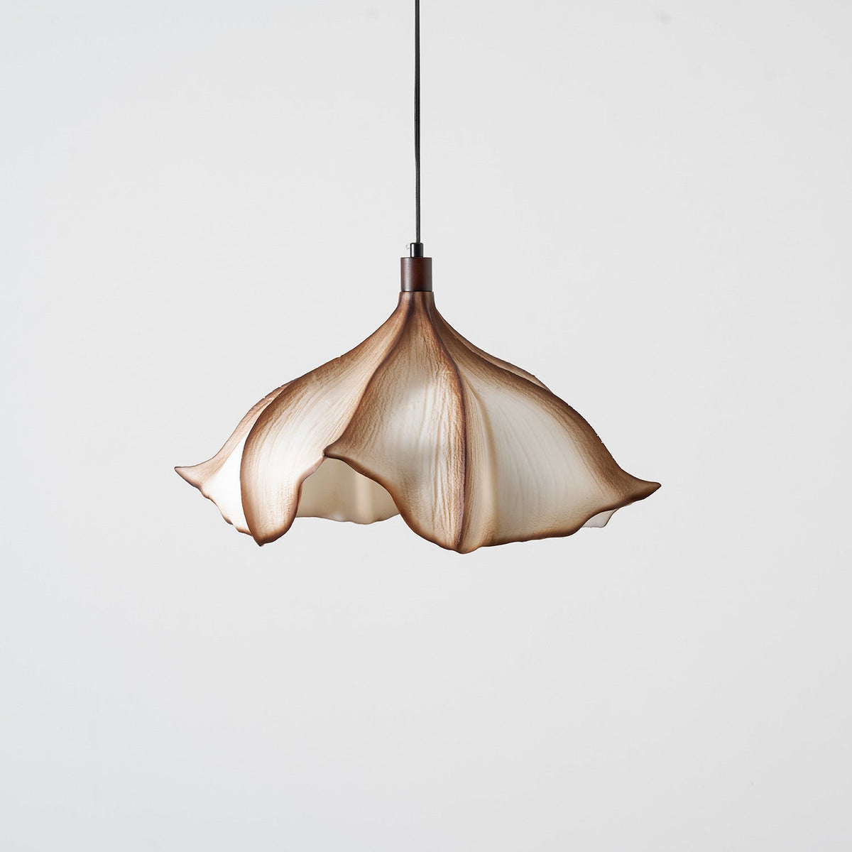 The white finish detail on the Viscontea swag light.