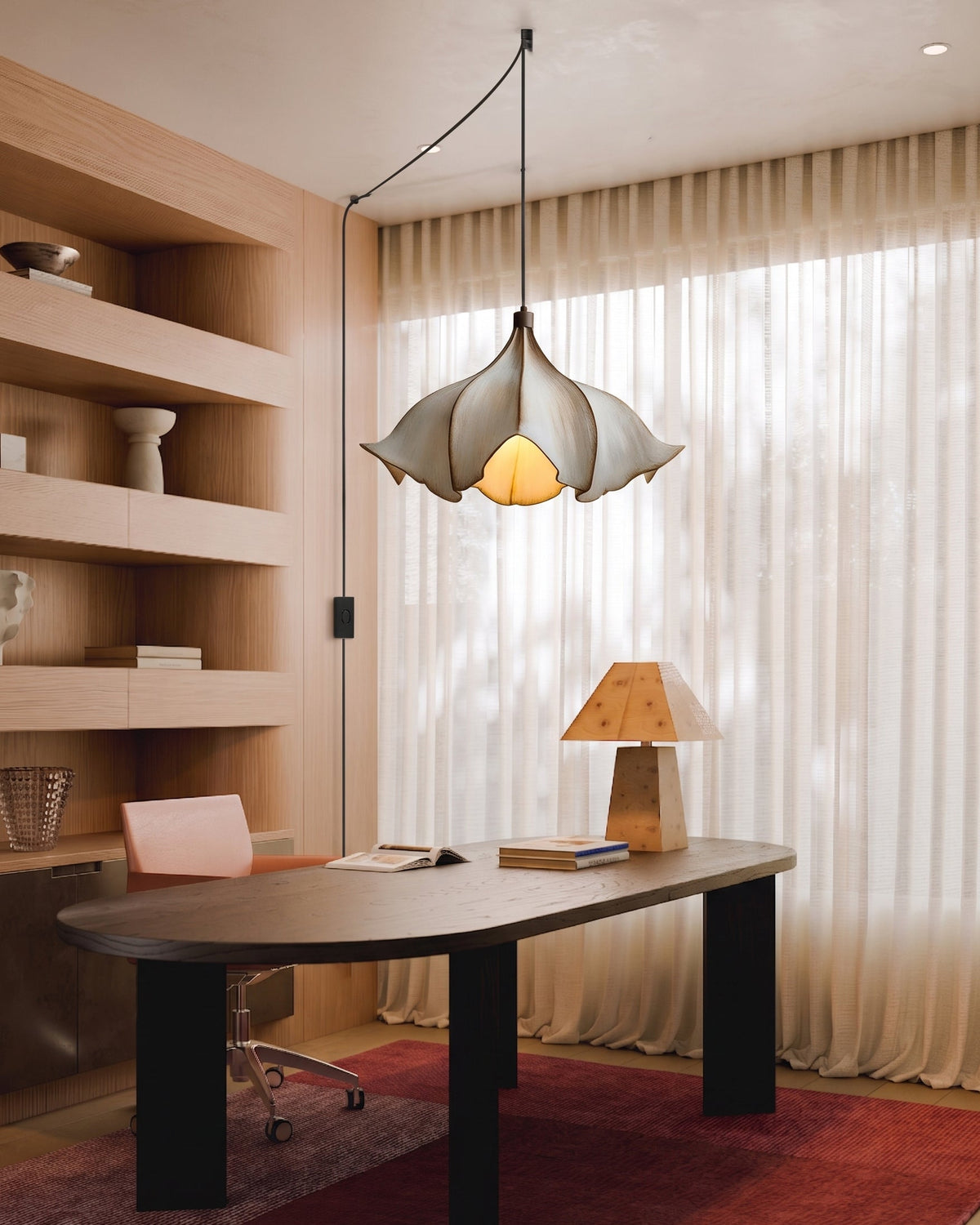 Viscontea swag light in a bedroom setting above a nightstand.