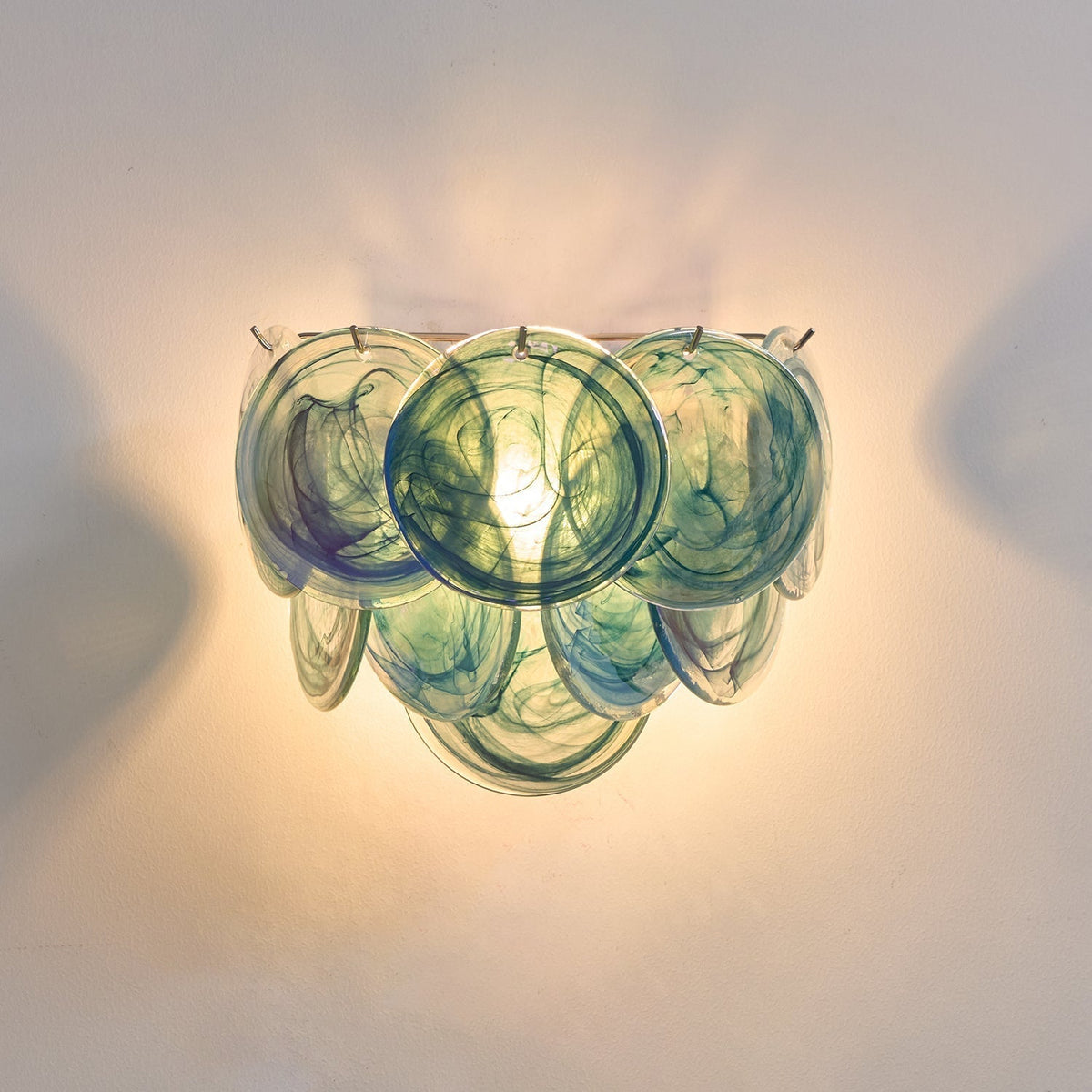 Comparison of the different color options for the Vistosi Disc Wall Lamp.