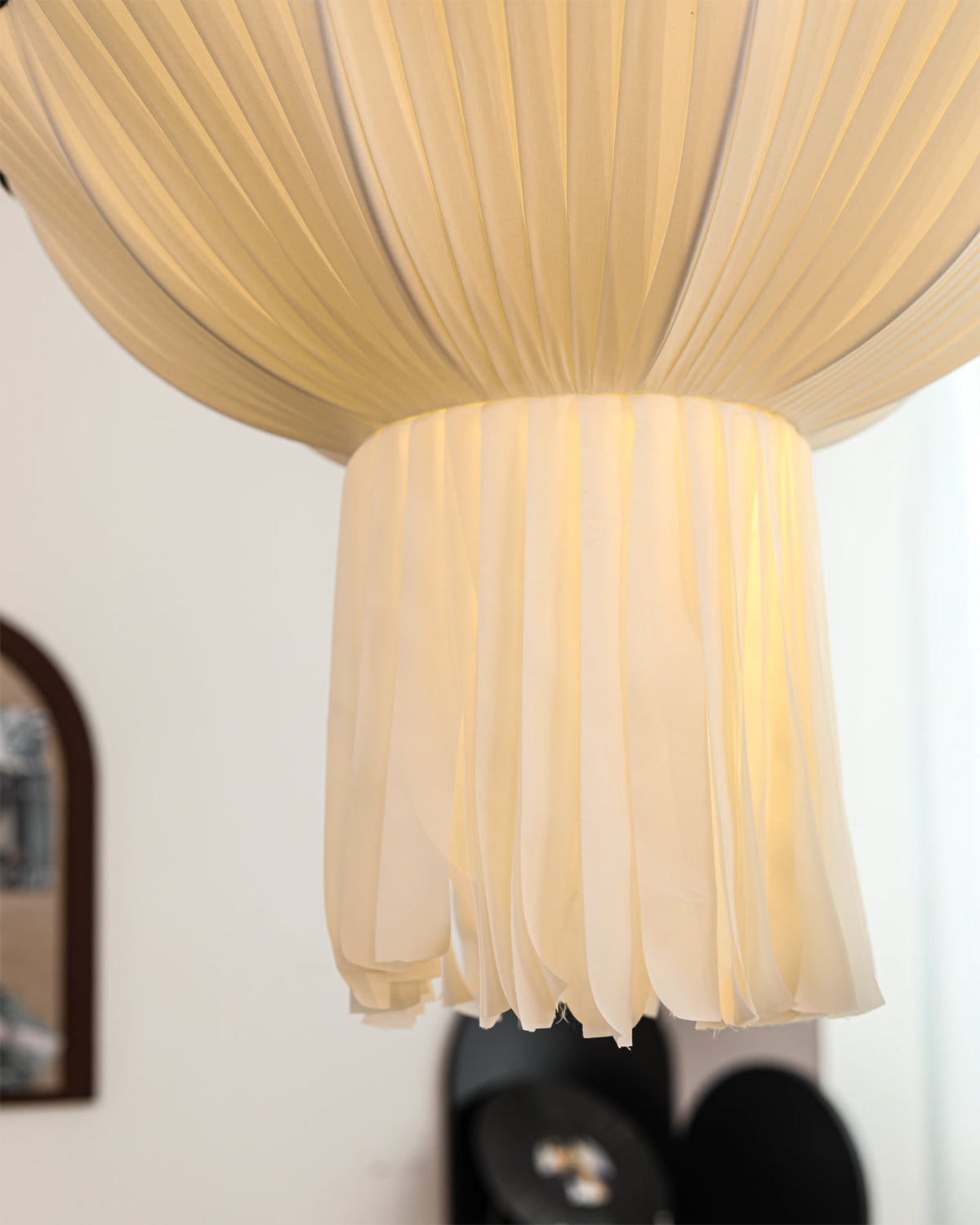 Lifestyle image featuring the Wildon Pendant Light in a cozy bedroom setting.