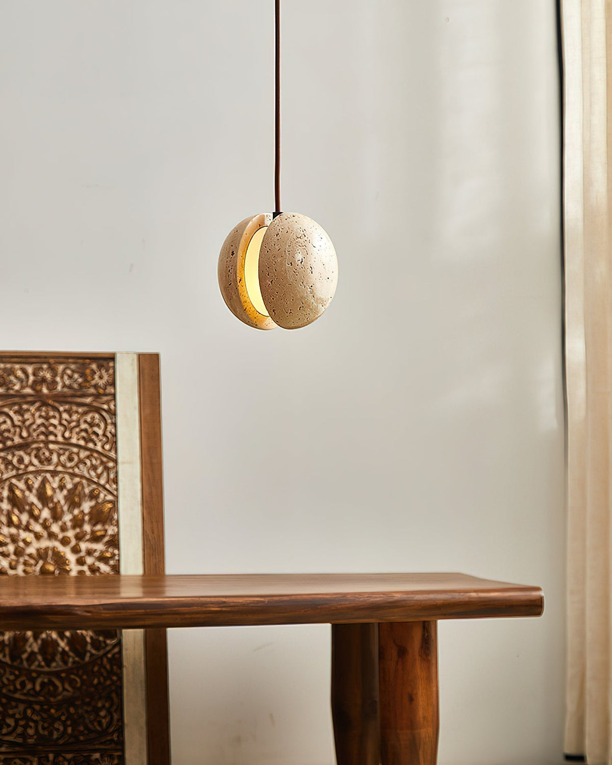 Close-up view of the Wisteria Pendant Lamp highlighting its natural stone texture.